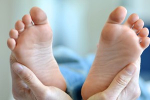Holding feet during a biodynamic craniosacral therapy session