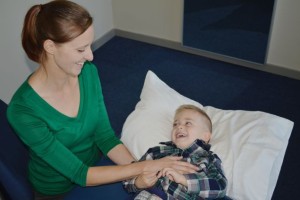 Biodynamic craniosacral therapy session with a toddler